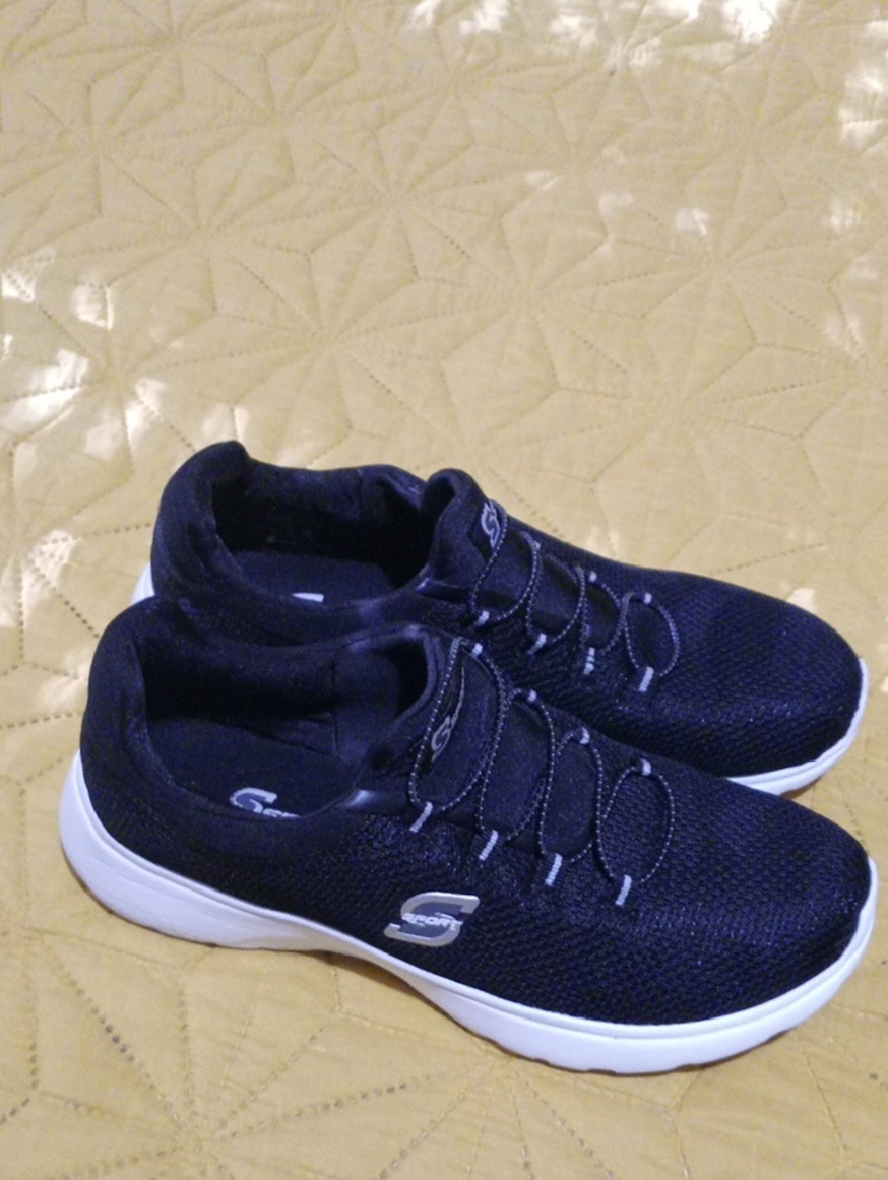 Skechers Black Knit Slip-On Sneakers with White Sole